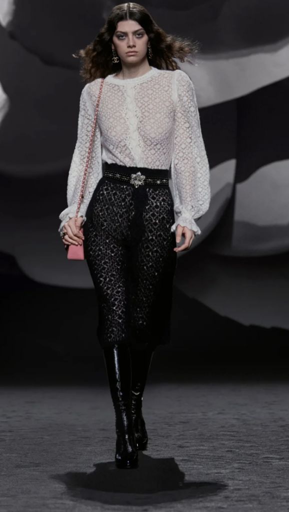 Runway look from Chanel representing the black and white fashion trend for winter